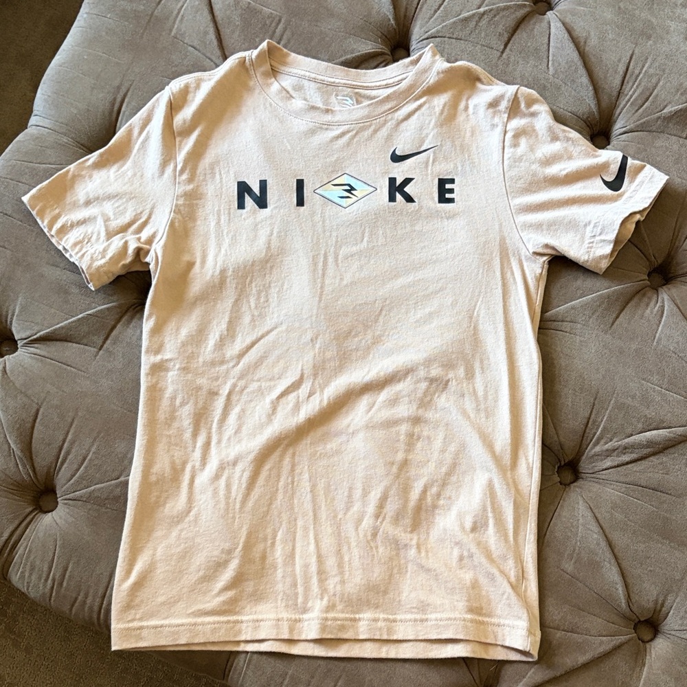 Tan Nike shirt